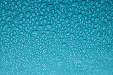 Fresh water drops on cold aqua blue background as elegant ocean frosty pattern of different drops...