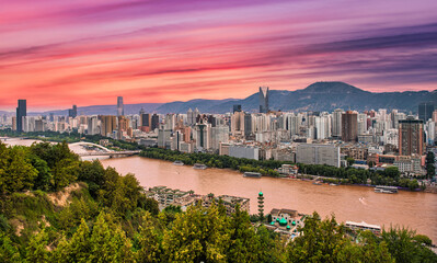 Fototapeta premium Sunset sky clouds over the Yellow River in Lanzhou. Gansu Province. China