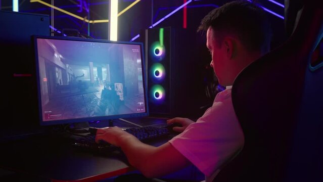 Player completing level in action FPS video game. Gamer advancing through the challenges in FPS video game. Achieving a mission victory in FPS video game. Modern military weapons. Fighting terrorism