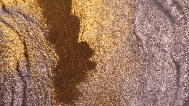 Gold dust particles fly in slow motion in the air lingering slowly. Snow particles background. High quality 4k footage. Dust Particles.