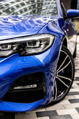 Fototapeta premium blue car on the road