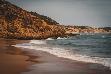 Coastal landscape with sea, rocks, beaches and horizon
