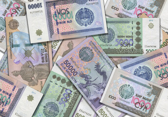 Paper money from Uzbekistan. Uzbekistani soum. Close up banknotes from Uzbekistan