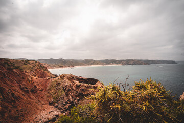 Coastal landscape with sea, rocks, beaches and horizon
