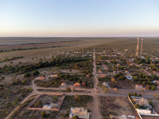 beautiful small country town with reddish sun