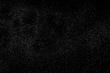 Obraz premium Distressed white grainy texture. Dust overlay textured. Grain noise particles. Rusted black background. Vector illustration. EPS 10. 
