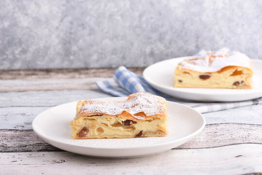 Topfenstrudel - piece of Austrian traditional handmade quark strudel 