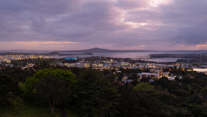 Dawn view of Auckland with mountain on the background.