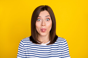 Photo portrait of pretty young lady smiling tongue out foolish naughty wear stylish striped garment...
