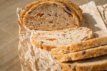 Homemade ciabatta bread with olives and sundries tomatoes