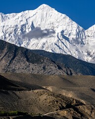 White snowy Nilgiri Mountain Peak seen from Kagbeni Village in Upper Mustang, Nepal