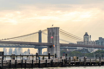 Spans of the Manhattan and Brooklyn bridges over the East River with Brooklyn in the background