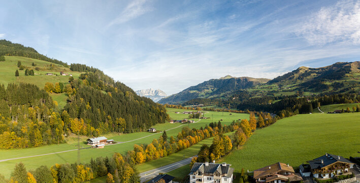 Aerial image of Aurach valley in colorful autumn season with Wilder Kaiser mountain at the background in the region of Kitzbuehel - a popular recreation region in Tirol, Austria