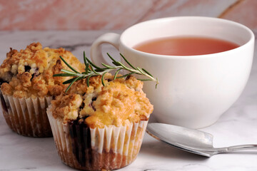 Blueberry Crumble Muffins on the marble floor