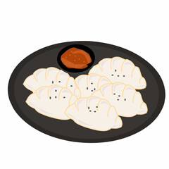 Korean Mandu Dumplings, made from flour dough and filled with seasoned chicken. Served on a plate with chili sauce
