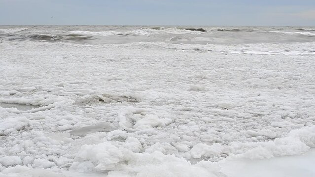 The frozen coast. Ice and wave
