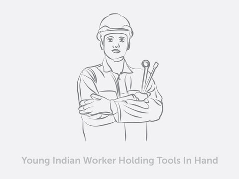 Young Indian Worker Holding Tools In Hand