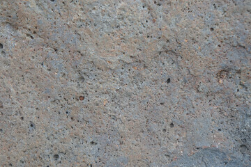 Texture of natural basalt extrusive igneous rock background.