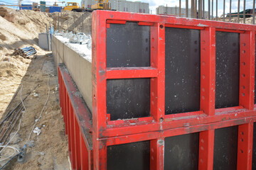 Clamped formwork panels at foundation construction