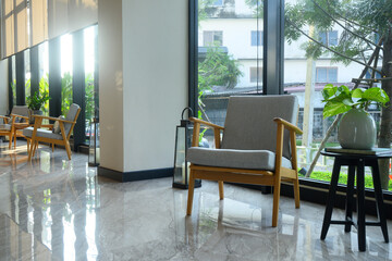 Interior of a modern hotel lounge cafe bar restaurant with beautiful sunlight.