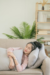 person relaxing on sofa