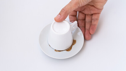 Fortune telling with coffee. Woman fortune teller predicting the future with coffee grounds