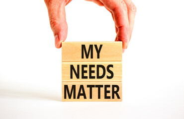 My needs matter symbol. Concept words My needs matter on wooden blocks. Businessman hand. Beautiful white table white background. Business, psychological and my needs matter concept. Copy space.