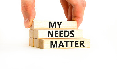 My needs matter symbol. Concept words My needs matter on wooden blocks. Businessman hand. Beautiful white table white background. Business, psychological and my needs matter concept. Copy space.