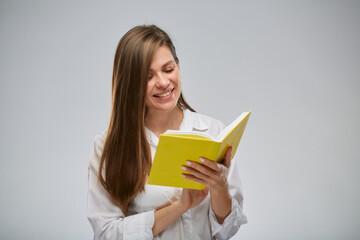 Student or teacher woman reading yellow book, isolated female portrait.