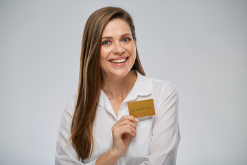 Young woman holding credit card. Isolated advertising female portrait on white.