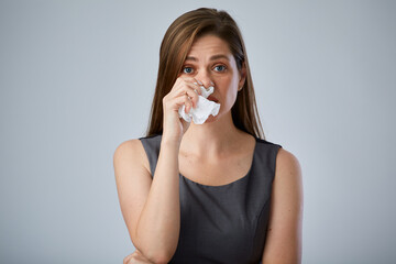 Allergy sick business woman with paper tissue isolated advertising portrait.