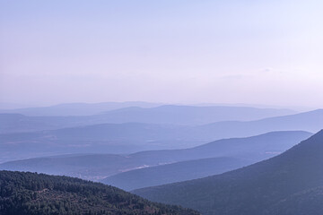 beautiful background of blazing sunrise in mountains blue hour