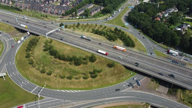 Traffic at a highway junction at Zwolle where the A28 highway runs through the city in Overijssel, The Netherlands.