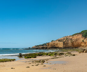 Fototapeta na wymiar Maria Luisa beach with rock formation in Albufeira, Algarve, Portugal. 
