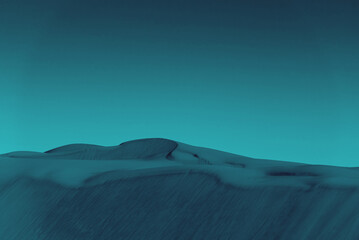 Sand Desert dunes background dark teal color toned
