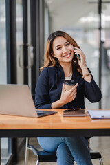 Asian businesswoman chatting on smartphone, auditor, document search, report, analysis, tax, accounting, document, data, contract, agreement at work.