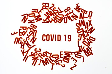 Fototapeta na wymiar covid 19. letters on a light background 