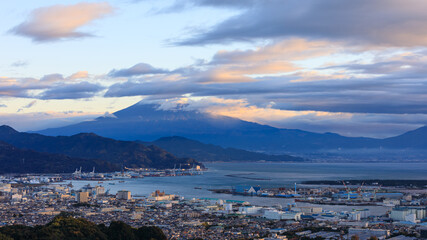 Cityscape at morning view and industry zone shipping port international and fuji mountain background in japan