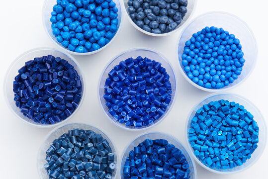 different blue colored plastic resins in laboratory