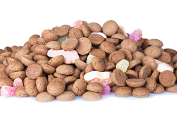 Heap of Dutch ginger nuts and sweets isolated over white