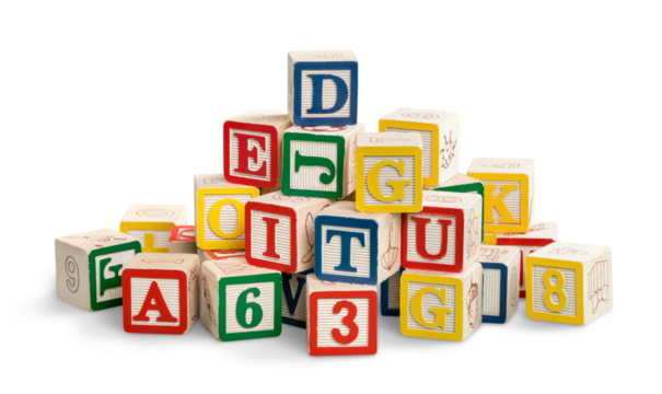 Colorful toy blocks with letters on white background