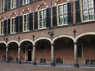 Historic Building with Archway at the Binnenhof Courtyard in The Hague, Netherlands