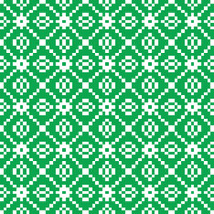 White cross-stitch knitting pattern on green background. White square dots on green backdrop. Fabric pattern design for sale. Knitting handicraft art.