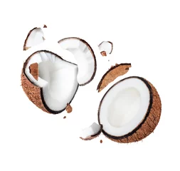 Foto op Plexiglas Crushed coconut close up in the air isolated on white background © Krafla