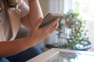 close up of hands using a mobile phone