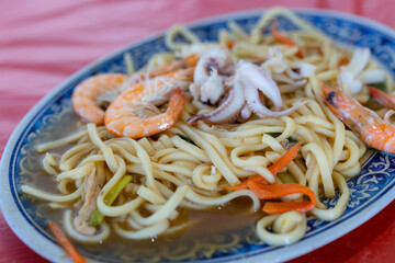 Seafood fry noodles with shrimp and squid