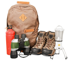 Hiking boots, backpack and map  on background