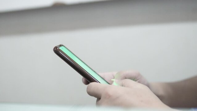 person using smartphone. close up hand. 