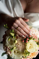 Elegance bride with wedding bouquet
