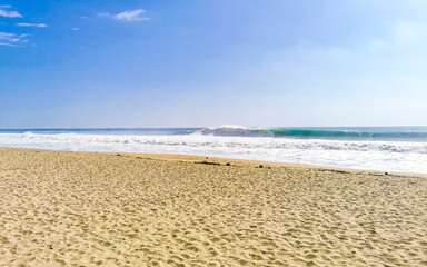 Extremely huge big surfer waves at beach Puerto Escondido Mexico.